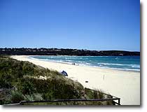 Merimbula Beach can be reached in 3 minutes